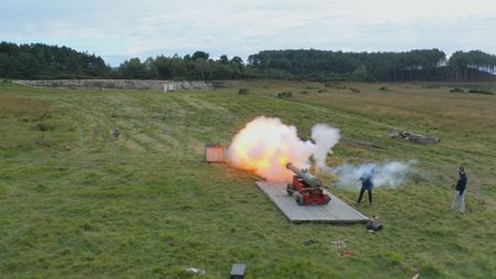 A Napoleonic era cannon replica is being fired. (National Geographic)