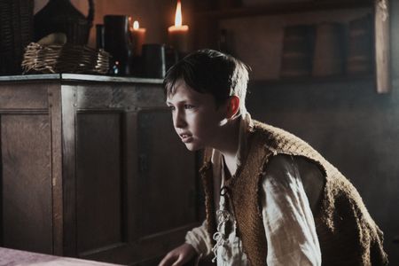 A young boy creeps through the Haltridge kitchen. (Dash Productions Services LTD/Antoan Ivanov)