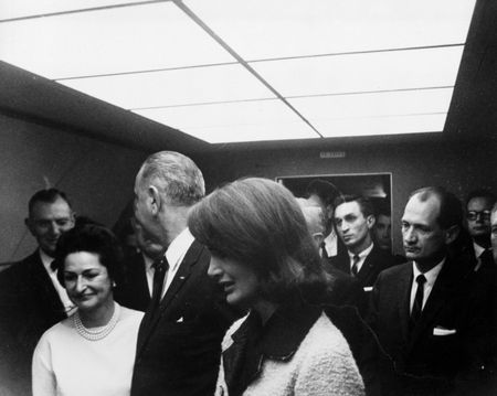 Lyndon B. Johnson is sworn in as President of the United States during ceremony aboard Air Force One, Nov. 22, 1963, in Dallas. Former first lady Jacqueline Kennedy stood beside him during the ceremony. (Cecil Stoughton/White House Photographs/John F. Kennedy Presidential Library and Museum, Boston)