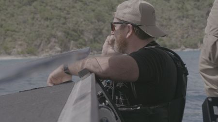 CBP AMO Agent Jeff searches for suspected contraband in St. Thomas, USVI. (Lucky 8 TV/Paul Taggart)