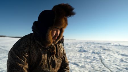 Gage Hoffman ice fishing. (BBC Studios Reality Productions, LLC/Brian Bitterfeld)