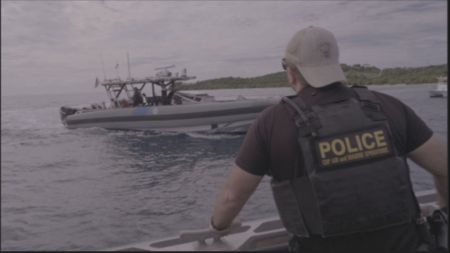 CBP AMO Agent Jeff is coordinating with another CBP AMO vessel in Fajardo, P.R. (Lucky 8 TV/Paul Taggart)