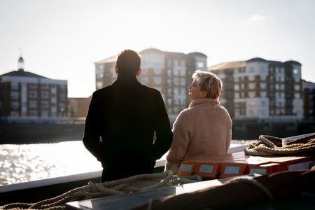 Antoni Porowski and Florence Pugh on a boat on the Thames. (National Geographic/Chris Raphael)