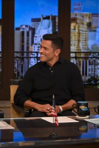 MARK CONSUELOS