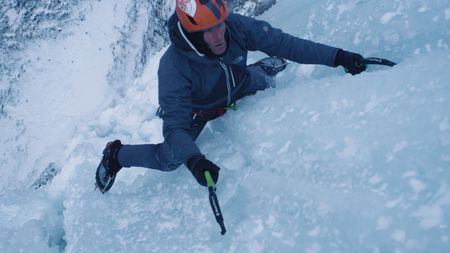 Conrad Anker climbs a wall covered in ice.  (Mandatory credit: Rocky Mountain Sherpas)