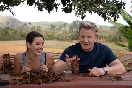 Mika and Gordon Ramsay learn to roll cigars. (National Geographic/Justin Mandel)