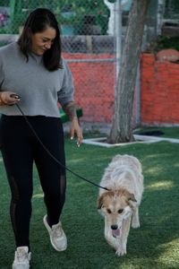 Victoria in a walking exercise with Maverick. (National Geographic)