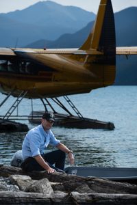 Joseph Fiennes gets ready for a boat ride in the beautiful aqua-green waters of Muncho Lake surrounded by an impressive backdrop of the foothills of the Rockies. Amidst mountains and whale watching, Sir Ranulph Fiennes and his cousin Joseph Fiennes reflect on Ran’s epic life and his new challenge of life with Parkinson’s. (National Geographic)