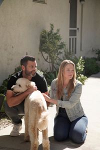 Thomas and Alex with their new dog. (National Geographic)