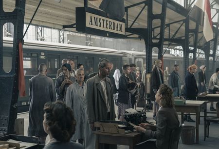 A SMALL LIGHT - Refugees returning from concentration camps arrive by train in Amsterdam as seen in A SMALL LIGHT. (Credit: National Geographic for Disney/Dusan Martincek)