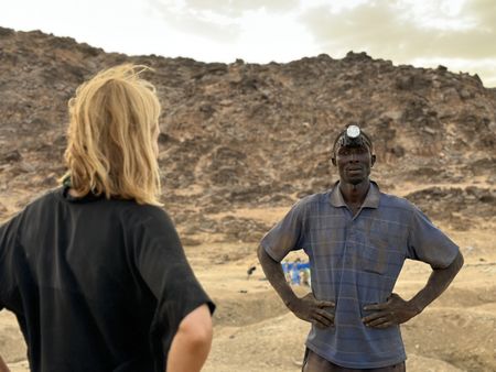 Mariana van Zeller speaks with Issoufou at Fallo Mine in Niger. (National Geographic for Disney)