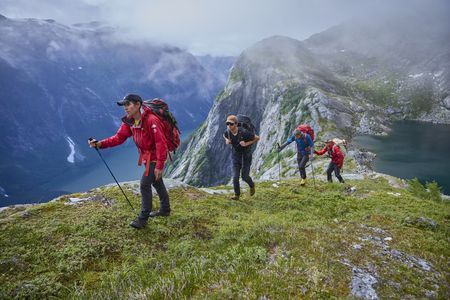 Alex Honnold, Taylor Shaffer, Tommy Caldwell and Waldo Etherington hiking up and over a mountain pass between Upper Scenery Lake and the Witches Cauldron.  (National Geographic/Matt Pycroft)