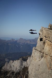 Espen Fadnes and Amber Forte wingsuit off a cliff in Chamonix, France.(Photo credit: Reel Peak Films)