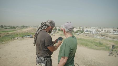 Jan Heiler and Ulrike Buerger measure a recently discovered chamber in Mosul, Iraq. (Windfall Films/Ali Hilal Ali Hussain)