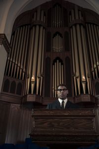Malcolm X, played by Aaron Pierre, preaches in GENIUS: MLK/X. (National Geographic/Richard DuCree)