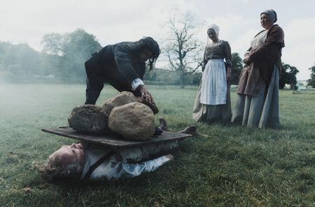 Giles Corey is pressed to death.(Dash Productions Services LTD/Antoan Ivanov)