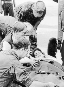 Jackie Speier, legal aide to Congressman Leo Ryan, is taken from a plane in Georgetown, Washington, D.C., after its arrival from Jonestown, Nov. 19, 1978. Speier was shot five times and Congressman Leo Ryan and four others were ambushed and killed by members of the People's Temple. Congressman Ryan was leading a group that went to Guyana to investigate reports of abuse and human rights violations by the Peoples Temple and its leader, Jim Jones. (Getty Images)