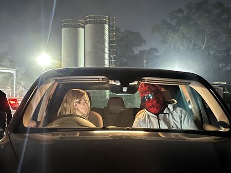 Mariana van Zeller talks to Chris in a car. (National Geographic for Disney)