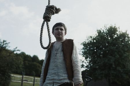 A young boy looks at the noose hanging in front of him. (Dash Productions Services LTD/Antoan Ivanov)