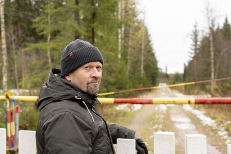 Finnish historian Mika Kulju at Raate Rd, where a vastly outnumbered Finnish force successfully defended against thousands of Soviet troops during the Winter War 1939. (National Geographic/Ciaran Henry)