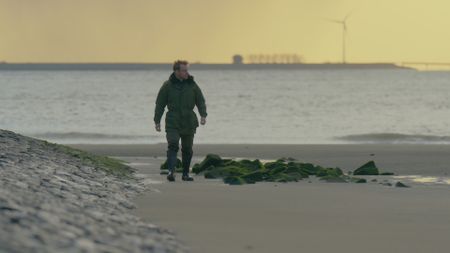 Andy Torbet walking on the beach. (National Geographic)