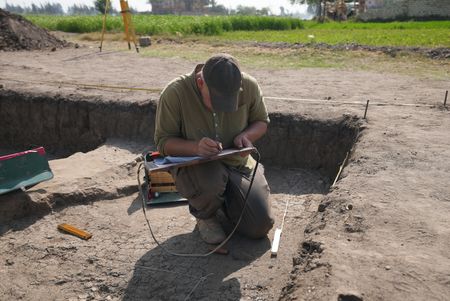 Frank Stremke takes measurements at the Pi Ramesses dig site in Egypt. (Windfall Films)