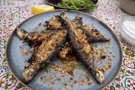 Portugal - Grilled sardines stuffed with peppers, tomatoes, chilies and garlic bread crumbs. (Credit: National Geographic/Justin Mandel)