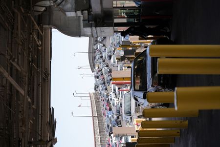 Multiple vehicles are waiting in line in order to cross the border at El Paso, TX.  (National Geographic)