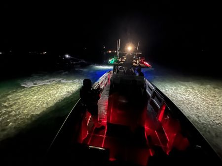 An aerial view shows CBP Agents out at sea on a water vessel at night  in St Thomas, USVI. (Lucky 8 TV)