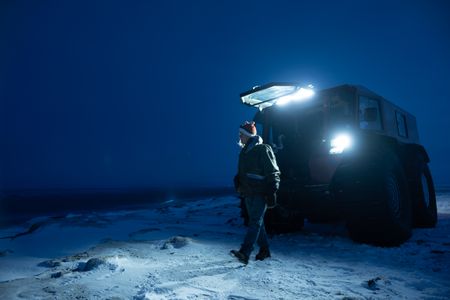 Sue Aikens travels to the Artic Ocean in her all terrain vehicle by night. (BBC Studios Reality Productions, LLC/Jayce Kolinski)