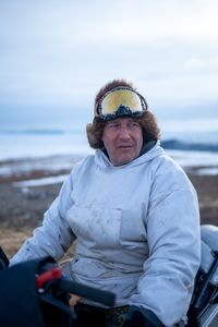 Chip Hailstone prepares  his snowmobile to travel to a nearby location to build a bird blind during the early spring migration. (BBC Studios Reality Productions/Ashton Hurlburt)