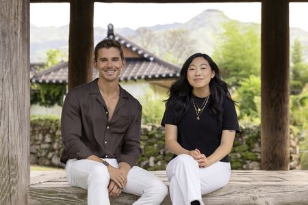 Antoni Porowski and Awkwafina in the upcoming docuseries NO TASTE LIKE HOME WITH ANTONI POROWSKI. (Credit: National Geographic/Seong Joon Cho)