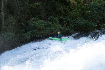 NC - Gordon Ramsay navigates a challenging kayak run using hand paddles on a river in the Great Smoky Mountains of North Carolina. (Credit: National Geographic/Justin Mandel)