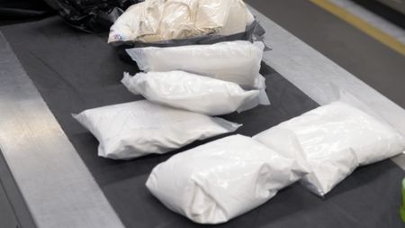 CBP is concerned by the appearance of multiple bags of starch that were placed on an inspection table after they were found in a passenger's luggage in Atlanta, Ga. (National Geographic)