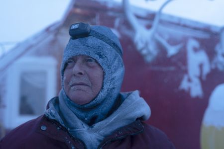 Sue Aikens checks her camp and installs safety precautions during a winter storm. (BBC Studios Reality Productions, LLC/Jayce Kolinski)