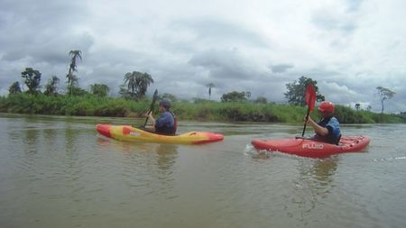 Chris Korbulic and Hendri Coetzee kayak down a calm section of river.  (mandatory photo credit: Benjamin Stookesberry)