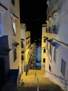 Narrow streets against the night sky in Morocco. (National Geographic for Disney)