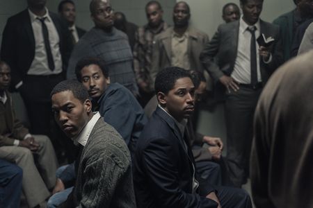 Martin Luther King Jr., played by Kelvin Harrison Jr. (center right), and Ralph Abernathy, played by Hubert Point-Du Jour (back right), in jail in GENIUS: MLK/X. (National Geographic/Richard DuCree)