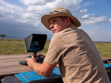Drone Pilot Barny Trevelyan-Johnson behind-the-scenes of Incredible Animal Journeys filming in Maasai Mara, Kenya. (National Geographic for Disney/David Chancellor)
