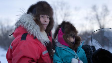 Ricko DeWilde with his daughter Maya DeWilde as they spot a moose in the distance. (BBC Studios/Ryan Walsh)