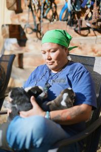 Jody Potts-Joseph with her puppies. (National Geographic/Ashton Hurlburt)