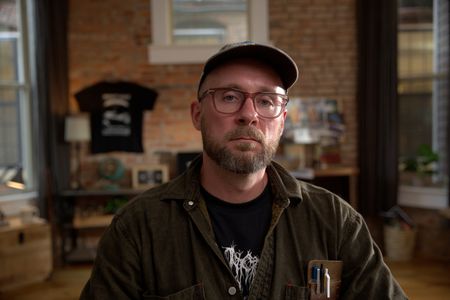 Journalist Dylan Taylor-Lehman is pictured in a portrait made during the production of "Cursed Gold: A Shipwreck Scandal." In 1989, maverick scientist Tommy Thompson stuns the world by recovering three tons of gold from a shipwreck deep in the Atlantic Ocean. What follows is a 30-year story of adventure, deception, and personal turmoil, taking him from venerated celebrity to infamous fugitive, and finally a defiant prisoner who refuses to give up his gold. (National Geographic)