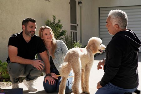 Thomas and Alex chat with Cesar about their new dog. (National Geographic)