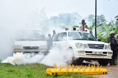 Bobi Wine, braves the tear gas with his campaign team in order to reach the campaign destination in Sironko District, Eastern Uganda, December 15, 2020.  (photo credit: Lookman Kampala)