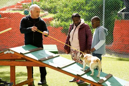 Cesar Millan showing Ramona and Roman a dog exercise. (National Geographic)