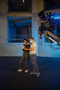 Diva Amon rehearsing with director Martin Cass at the studio lab shoot. (National Geographic/Aubrey Fagon)