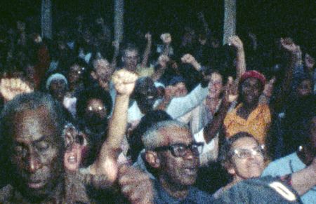 Peoples Temple members congregate during an event in Jonestown, Guyana. (California Historical Society)
