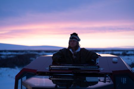 Sue Aikens is on the lookout for ptarmigan and rabbits as an opportunity to gather subsistence food during the winter season. (BBC Studios Reality Productions, LLC/Jayce Kolinski)