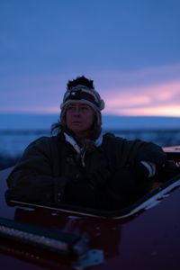 Sue Aikens travels in her all terrain vehicle, on the hunt for ptarmigan and rabbits. (BBC Studios Reality Productions, LLC/Jayce Kolinski)