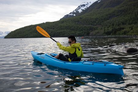 Alta, Norway - Albert Lin kayaking in Alta, Norway. (National Geographic/Hugh Campbell)